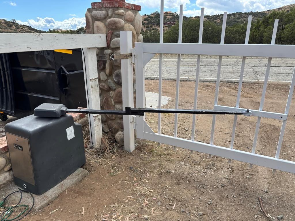 Elite gate repair technician at work
